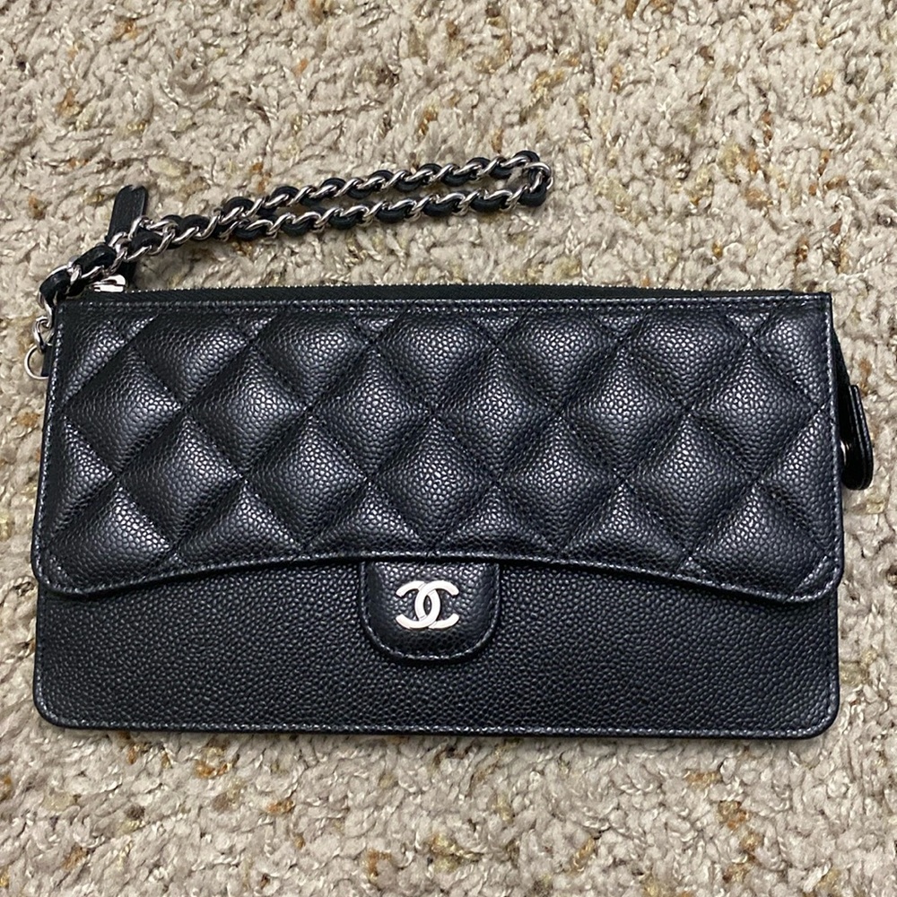 Gently used CHANEL Flat Wristlet in Black Caviar leather with silver hardware